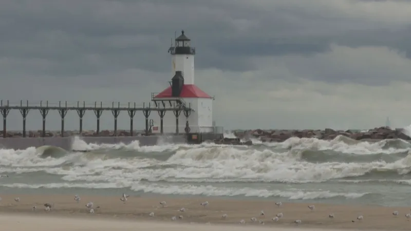Strong winds whipping up massive waves on Lake Michigan creates dangerous conditions