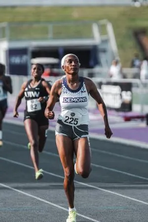 Dwyer breaks school record again on way to nationals berth