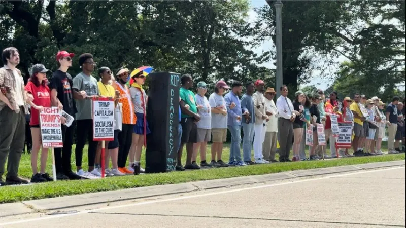 The Louisiana Mobilization Collective , along with several organizations, hosts voting rally outside the Governor's Mansion