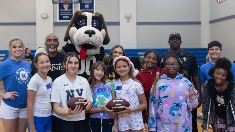 Photos: Saints, Hancock Whitney host Football and Finance Clinic with Michael Lewis and Devery Henderson