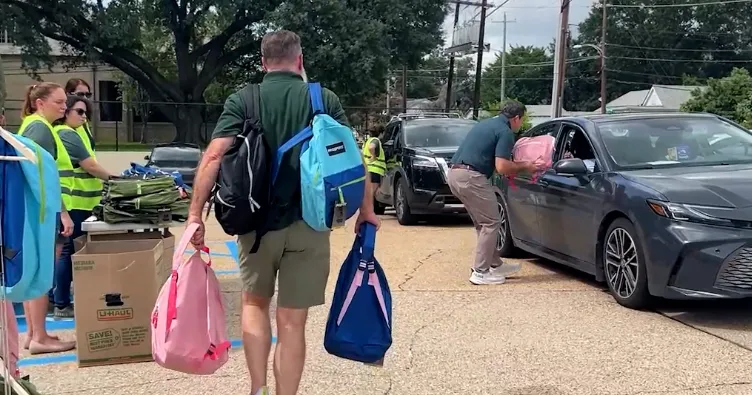 Local law firm hosts drive-thru backpack giveaway for Shreveport students
