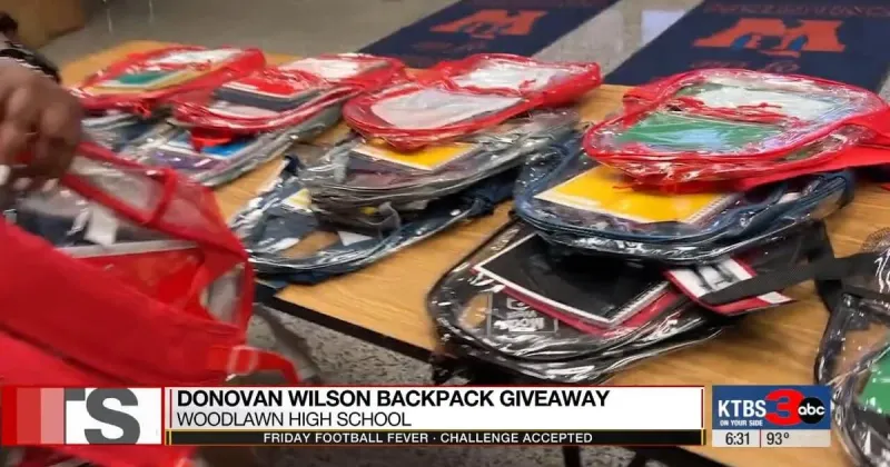 Donovan Wilson hosts backpack giveaway at Woodlawn