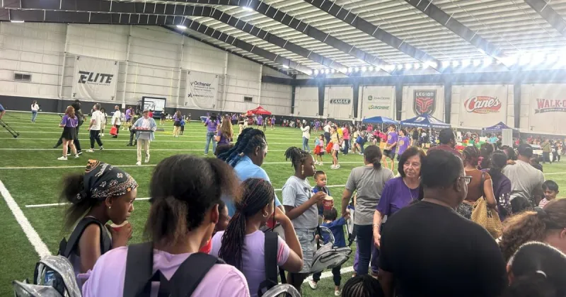 Burreaux Back to School giveaway draws large crowds and gives away 1,100 backpacks