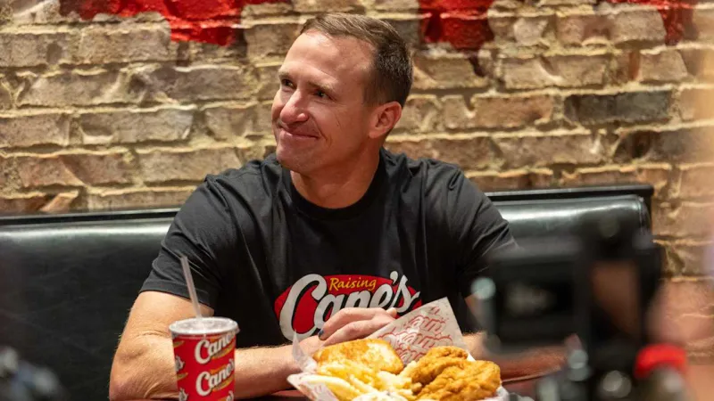 Photos: Drew Brees, Saints Legends attend Raising Cane's Event | Saints in Canton