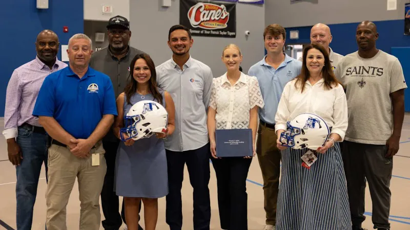 Photos: Saints, American Safety host helmet donation at Patrick Taylor High School