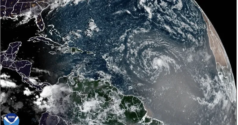 Dolly, now a tropical wave, moves west towards the Leeward Islands. See latest forecast.