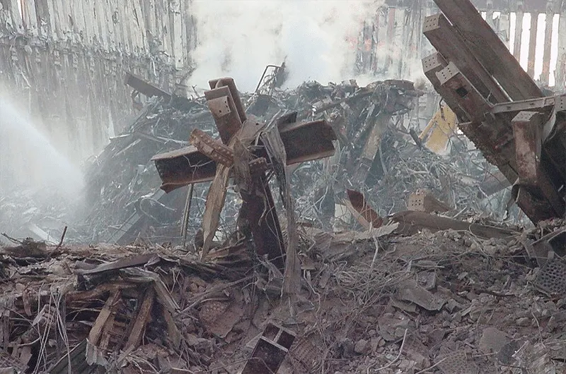 Cross found in the rubble. 25 years after 9/11: A lot has changed. And not much