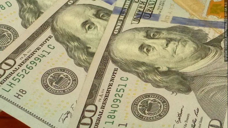 Federal Reserve hikes key rate for first time in 3 years, defying Trump demands for a cut