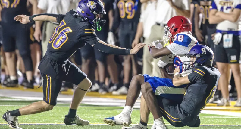 High school football: Benton rolls past Woodlawn
