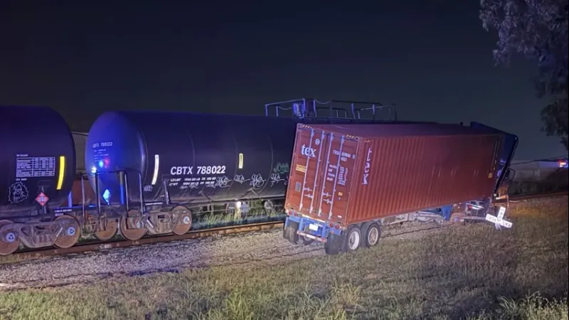 Driver of semi-truck hospitalized after colliding with train in West Baton Rouge; North Line Road closed