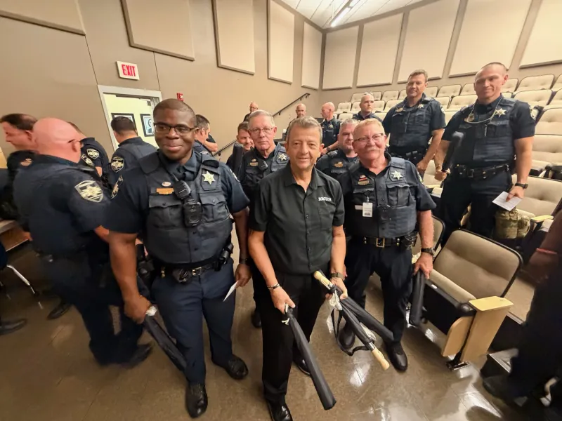 RRCU Provides Umbrellas for Bossier Schools SROs and Crossing Guards