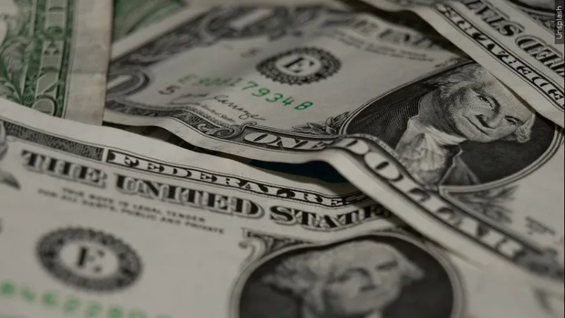 Inflation cooled slightly last month even as consumers stepped up spending