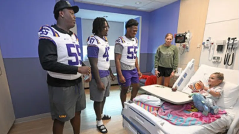 Our Lady of the Lake Children's Hospital hosts LSU football players for patient visit
