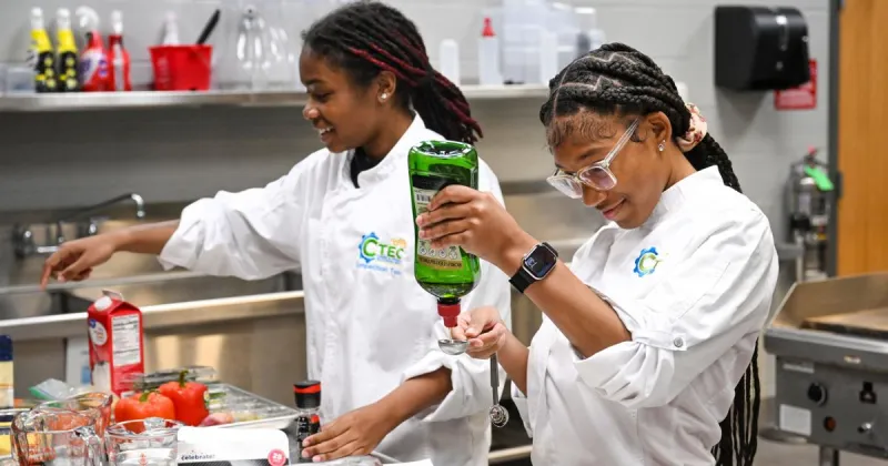 High school students learn culinary, life skills in culinary class led by dedicated chef