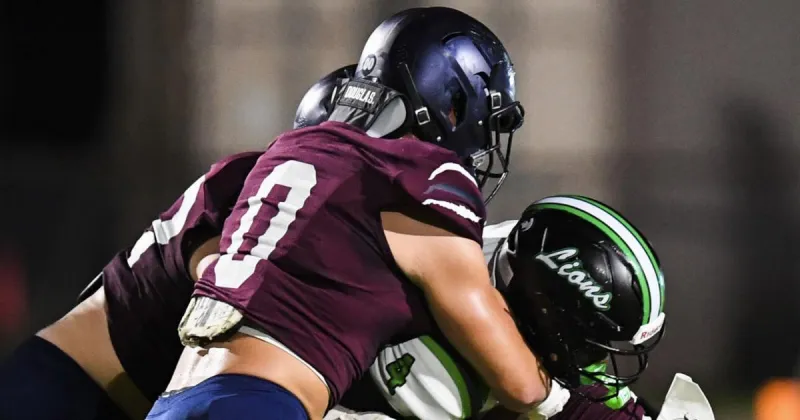 This St. Thomas More linebacker is a state champion wrestler who plays 'in a very violent way'