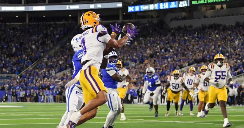 Kentucky clinches it with a 2-point conversion in OT and continues LSU's road woes in SEC play