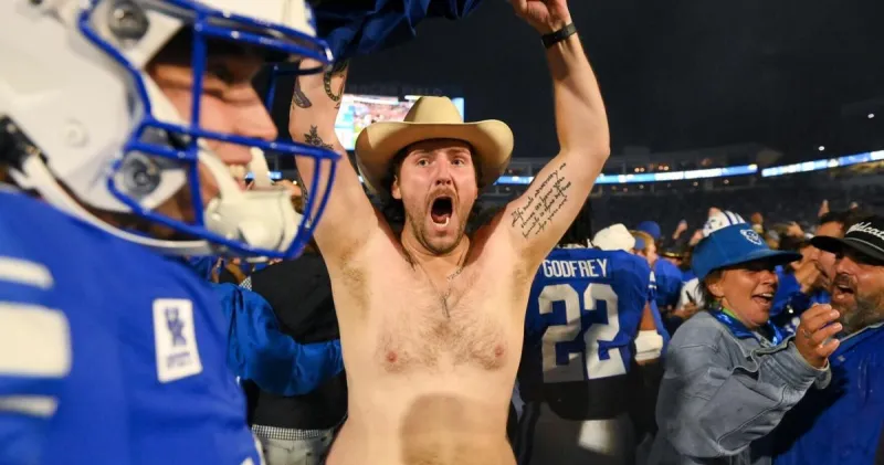 Kentucky's win is also windfall for LSU, as Wildcats must pay hefty fine for fans rushing field
