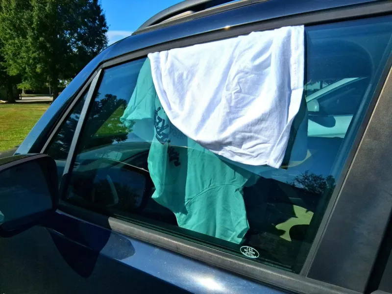 What Does a White Cloth Hanging From a Car Window Mean?