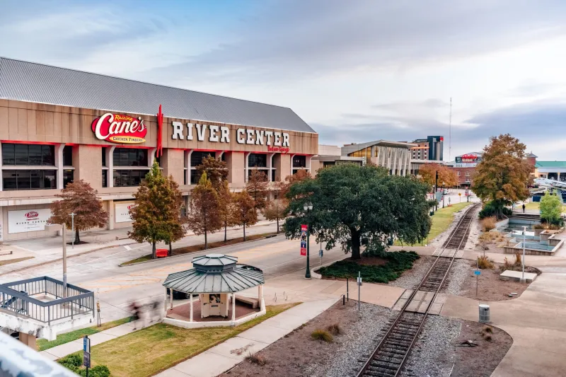 Two firms are competing to manage the River Center as redevelopment takes shape