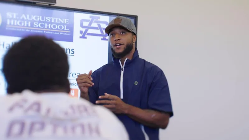 Recap: Justin Reid visits and gifts gear to St. Augustine Purple Knights