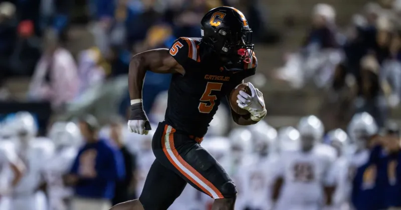 Catholic's star running back is following the legacy of school's past legends