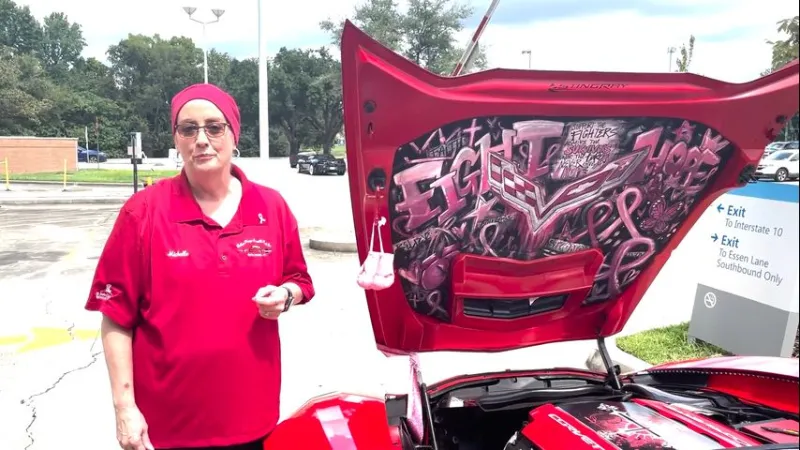Baton Rouge Corvette Club join Mary Bird Perkins staff to celebrate end of member's breast cancer treatment