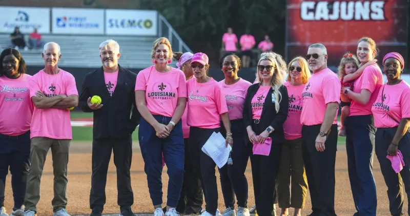 'They get me out of bed every day': How UL's softball coach is fighting cancer with her team.