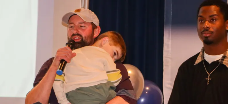 Fathers on a Mission celebrates 18 graduates