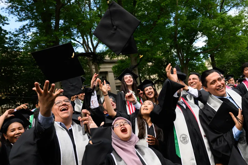 At a spirited Commencement ceremony, the Class of 2026 is urged to "run toward the hardest problems"