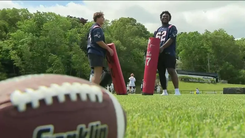 Patriots rookies join Newton youth football clinic as part of city's Juneteenth celebration
