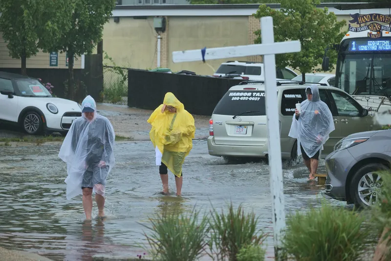 Heavy rain floods Beach Road