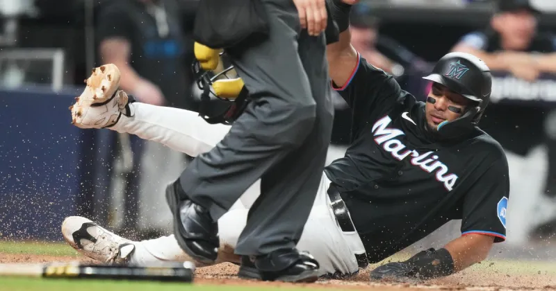 Boston Red Sox win 5th straight game with 7-3 extra-inning victory over Marlins in Miami