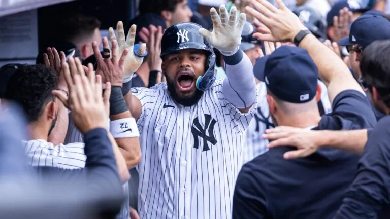 Austin Wells homers twice in 9-run eighth as Yankees rout Red Sox 16-1