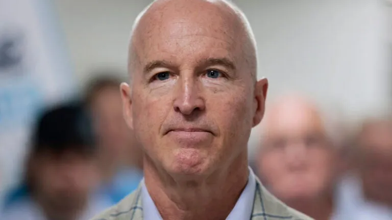 Minogue defeats GOP rival Shortsleeve, setting up clash with Healey
