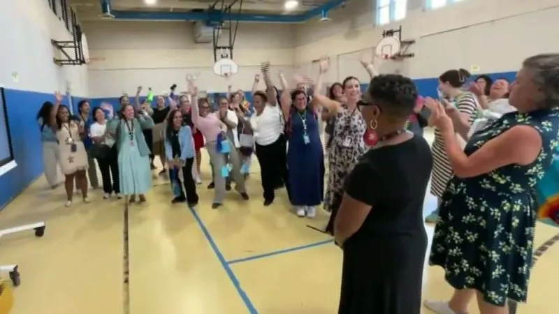 Drake and Ann Michael Maye donate money to teachers at RI elementary school