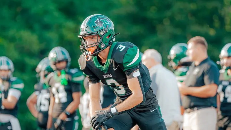Football Comeback Falls Short Against Coast Guard on Homecoming, 49-42