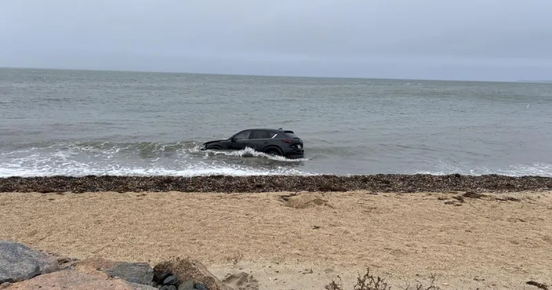 SUV Crashes Through Guardrail Into Water At Falmouth Heights