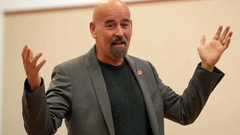 Deaton says Markey's rhetoric led someone to smash his law office window