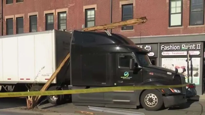 Tractor-trailer knocks down utility pole in Allston