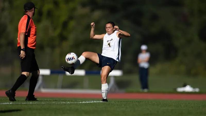 Soccer Falls on the Road at Clark