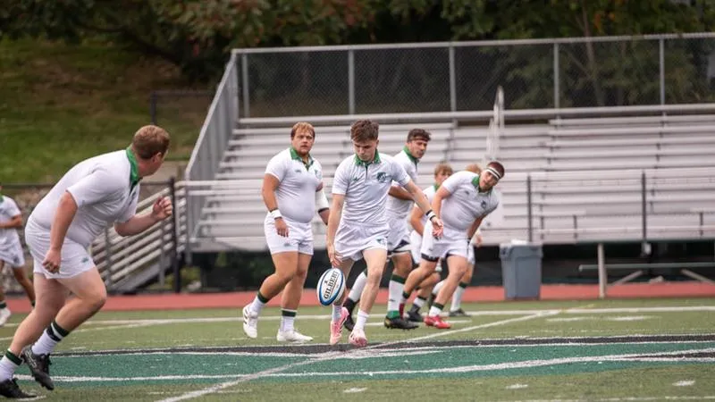 Nichols Men's Rugby Remains Unbeaten, Sweeps Rival Holy Cross in Road Finale