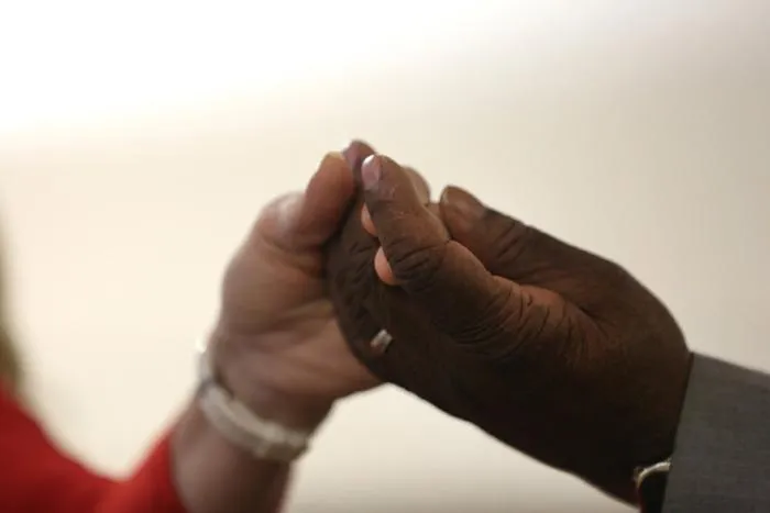 If the Church's law is silent on holding hands during the 'Our Father,' can't people interpret it as being appropriate?