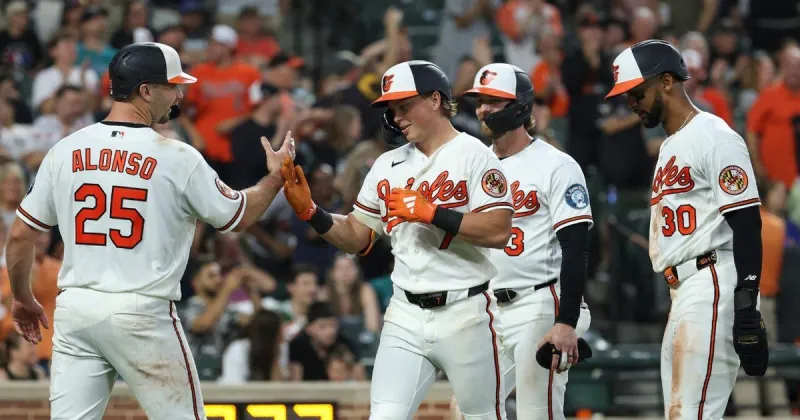 Holliday hits grand slam and Young pitches Baltimore Orioles past Seattle Mariners 7-2