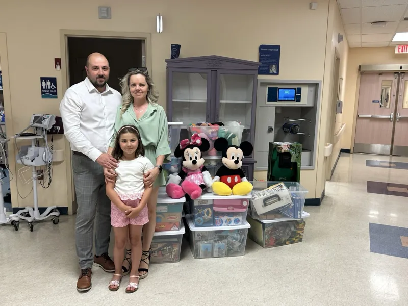 Local family gives over 450 toys to hospital