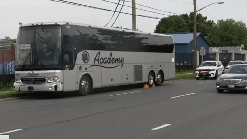 Loaded charter bus crashes after suspected brake problem, damaging poles, vehicles