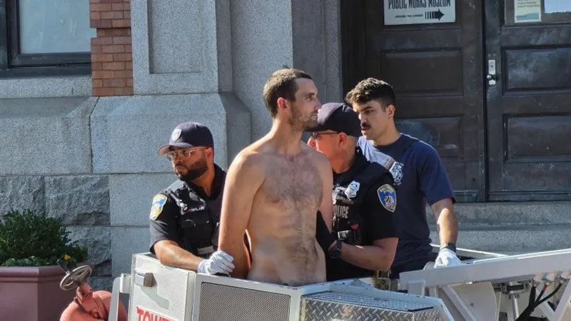 Naked protester draws police response in Baltimore's Little Italy
