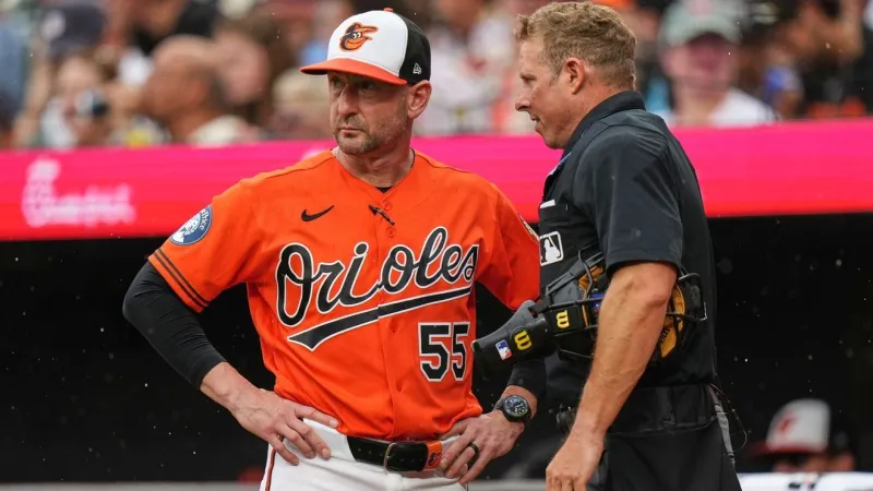 Phillies rout Orioles 8-0 in a game called by rain after 5 1/2 innings