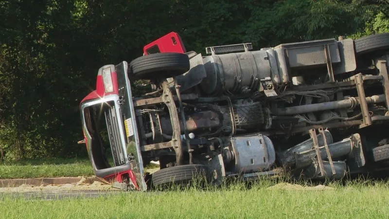 Dump truck flips, fuel spills after crash in Montgomery County