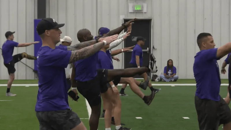 Fort Meade service members try NFL-style drills at Ravens facility during USAA boot camp