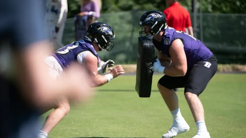 SUN: Ravens center Danny Pinter carted off field during practice vs. Vikings